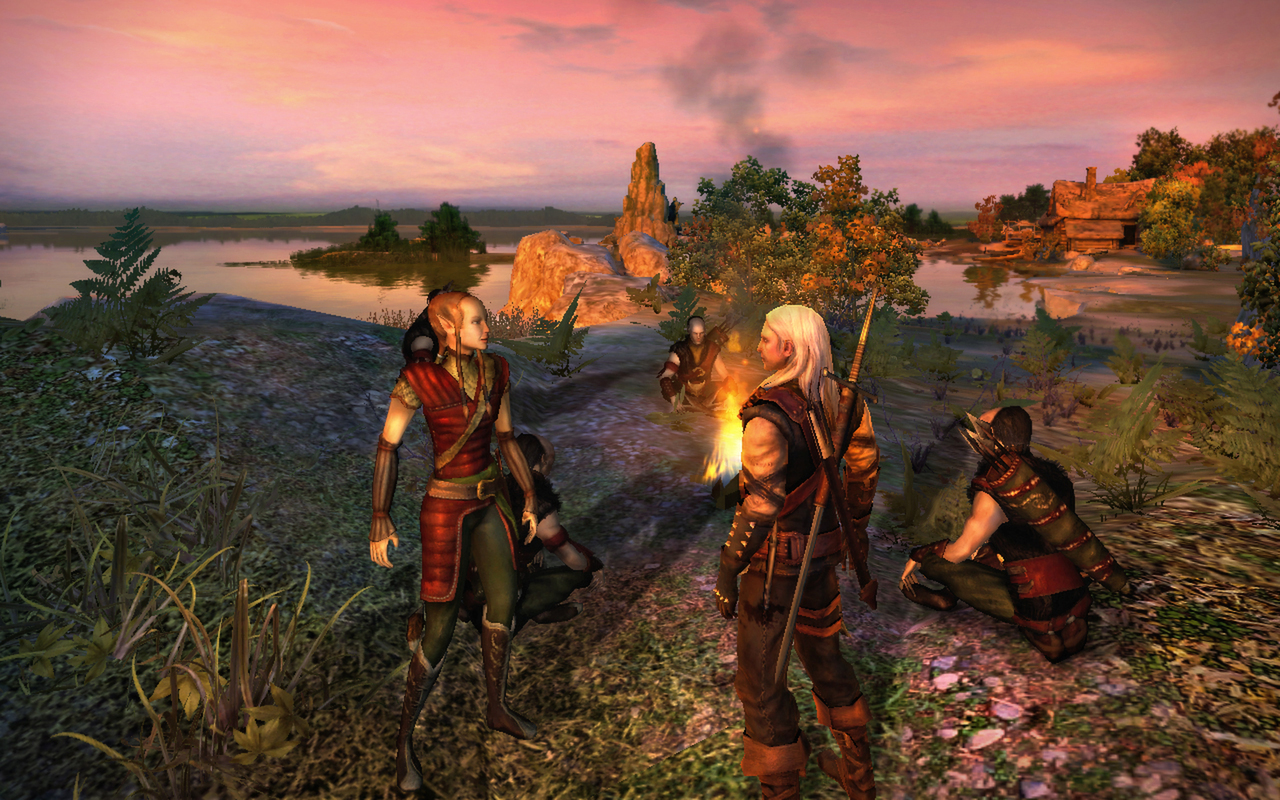 Atardecer en The Witcher 1 con personajes en la costa